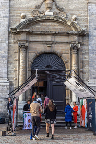 Konligo Arko470 foldable event structure with printed banners set up at the entrance of a historic building for a public event, now available on MTN SHOP US.