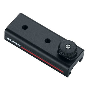 Carro deslizante Harken de 22 mm - Pinstop, sin fianza: los carros deslizantes utilizan inserciones de plástico de baja fricción para un movimiento lineal confiable. Vienen equipados con 2 orificios roscados M6 y un tope roscado que, cuando se fija, bloquea eficazmente el carro en su posición. – Ahora disponible en MTN Shop US.