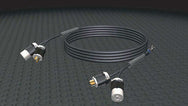 Motion Labs Overmold Y Dual Twist Hoist Cable coiled, with the Y end split into two twistlock connectors
